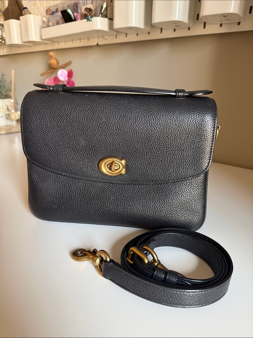 Coach Cassie Black Pebbled Leather Crossbody with Gold Turnlock